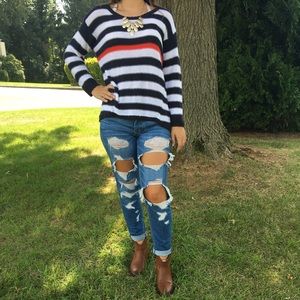 Navy blue and white striped sweater